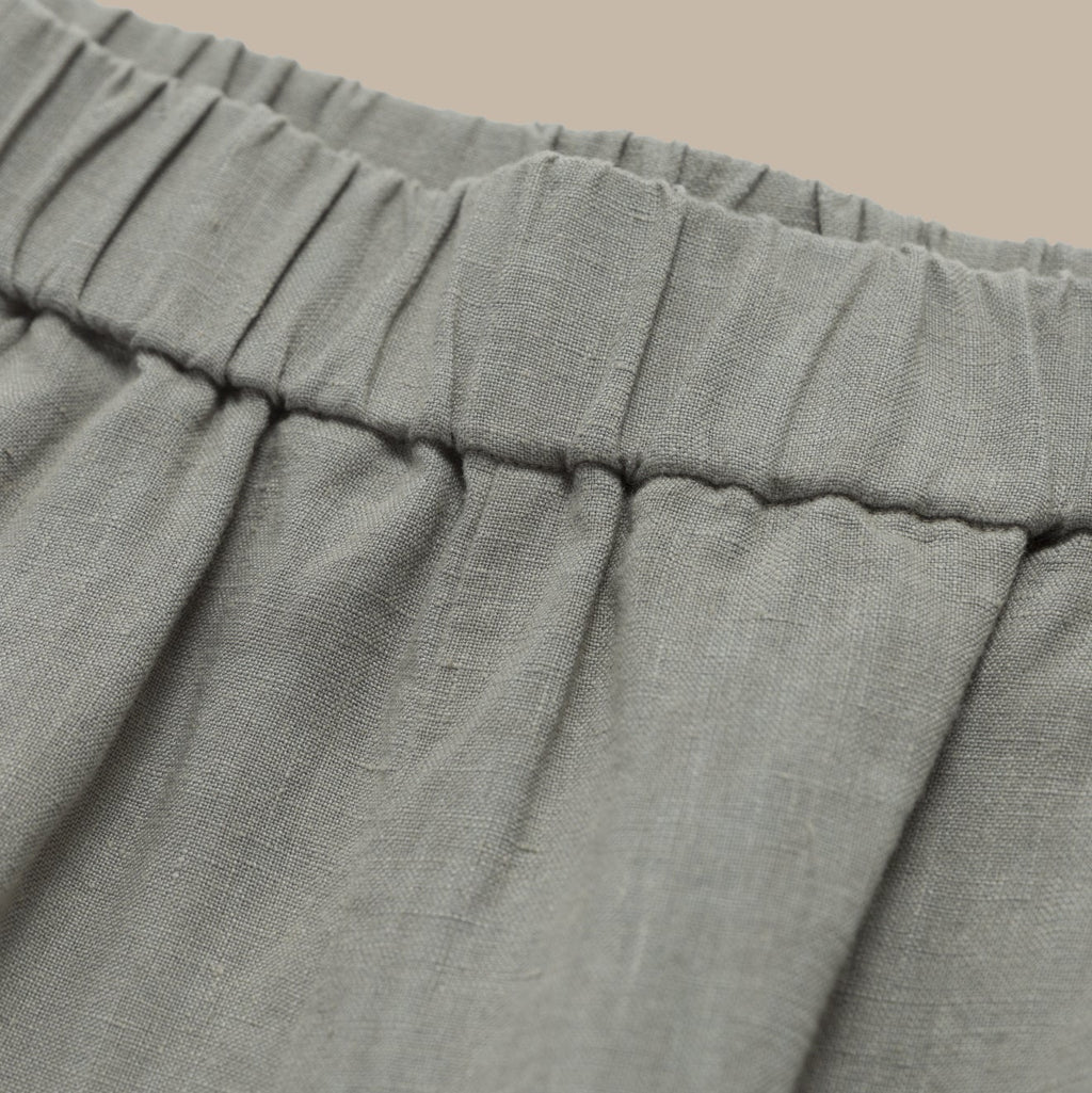 Close-up of a gray fabric with a beige background